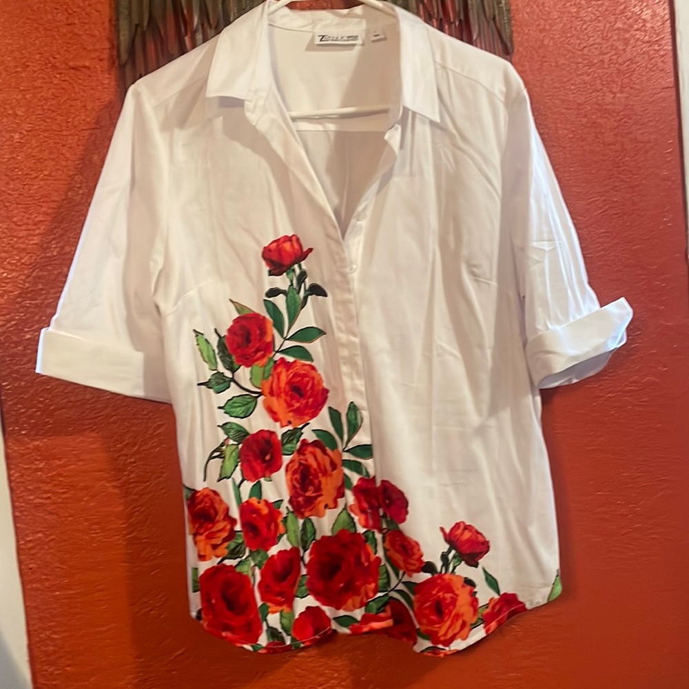 Gorgeous white blouse with roses.